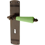 Zimmertürgarnitur Bottens in Messing, antik